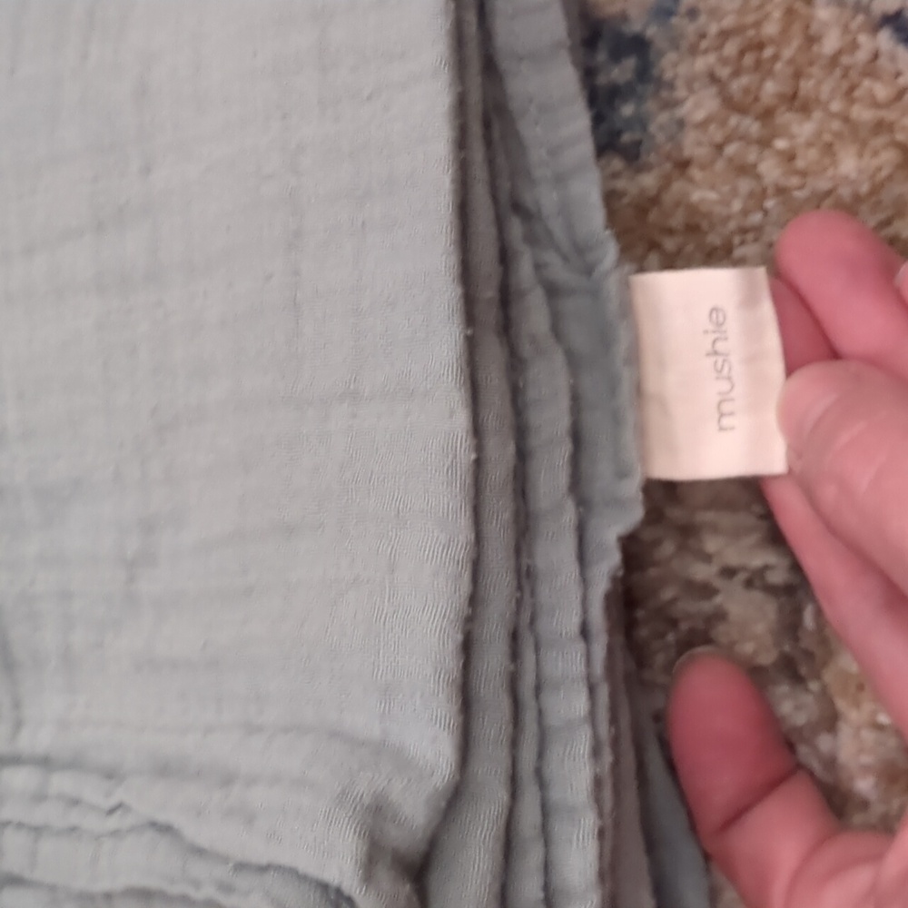 Mushie Organic Cotton Light Sage Swaddle